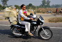 Three on a motorbike