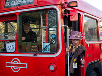 Julia with champagne and Ken Bruce on the BBC Children in Need bus
