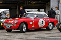 Beverley Phillips behind her MGB