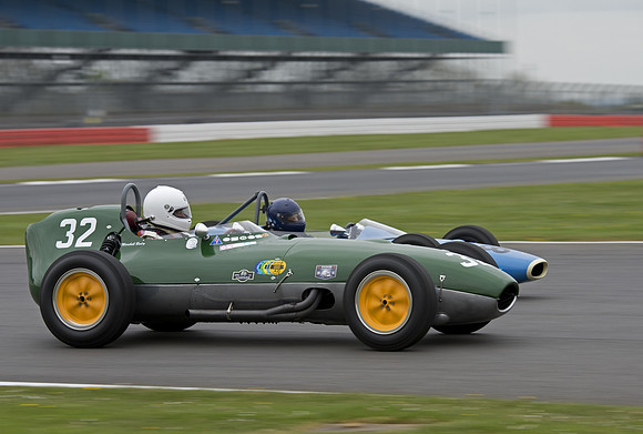 Marshall Bailey in his Lotus 16 Climax overtakes on the bend