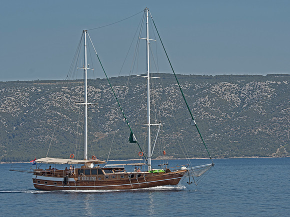 Cruising boat passes MS Mendula