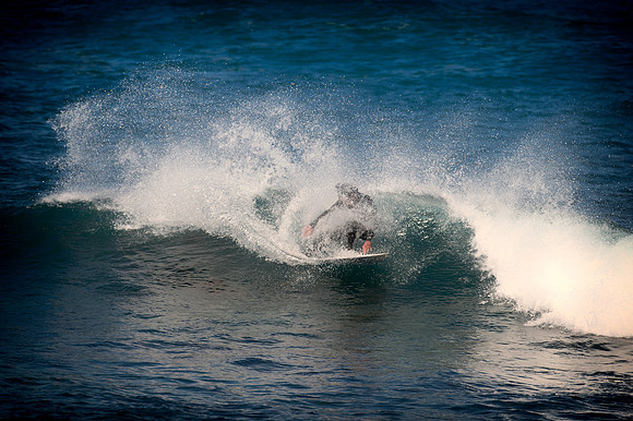 Surfer ride the waves