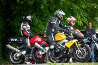 Stuart Mills, in front, on his Asprillia Tuono motor cycle at Gurston Down