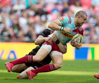 Mike Brown of Harlequins is tackled