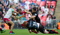 Dave Ward of Saracens pulls down a Harlequin player