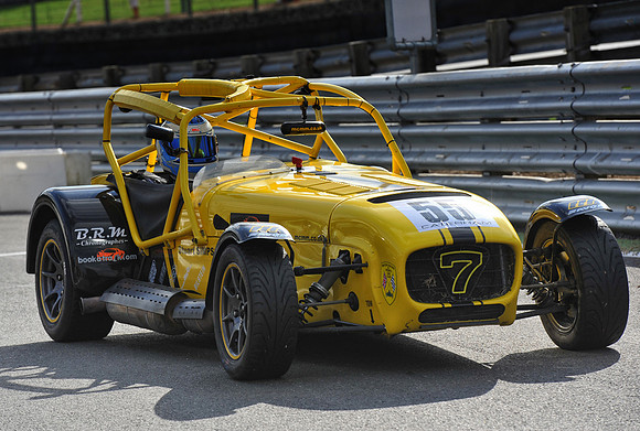 Stuart Simpson in the Caterham Superlight R300 enters the pit lane