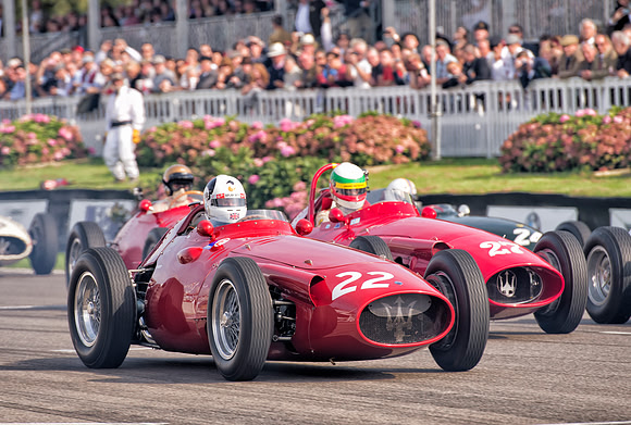 Allan Miles surges ahead of Jose Albuquerque at the start in the Maserati 250F