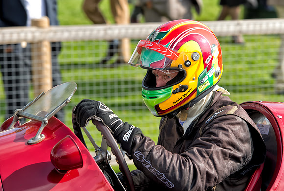 Andy Wolfe in his 1935 Maserati V8RI  returning to the paddock