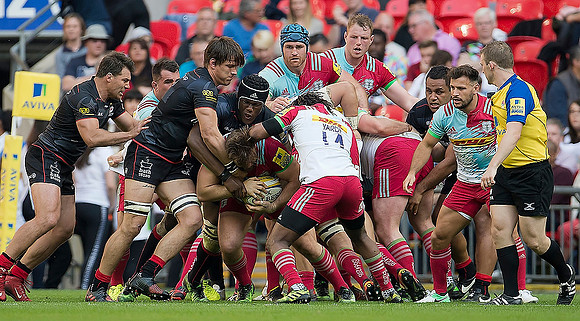 Rugby Saracens v Harlequins at WembleyFull on tackle at the Saracens v Harlequins rugby match