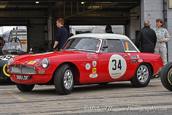 Beverley Phillips behind her MGB
