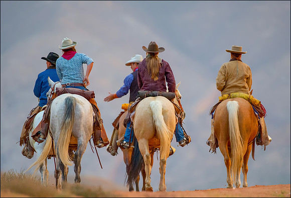 Cowboys heading back after a ride